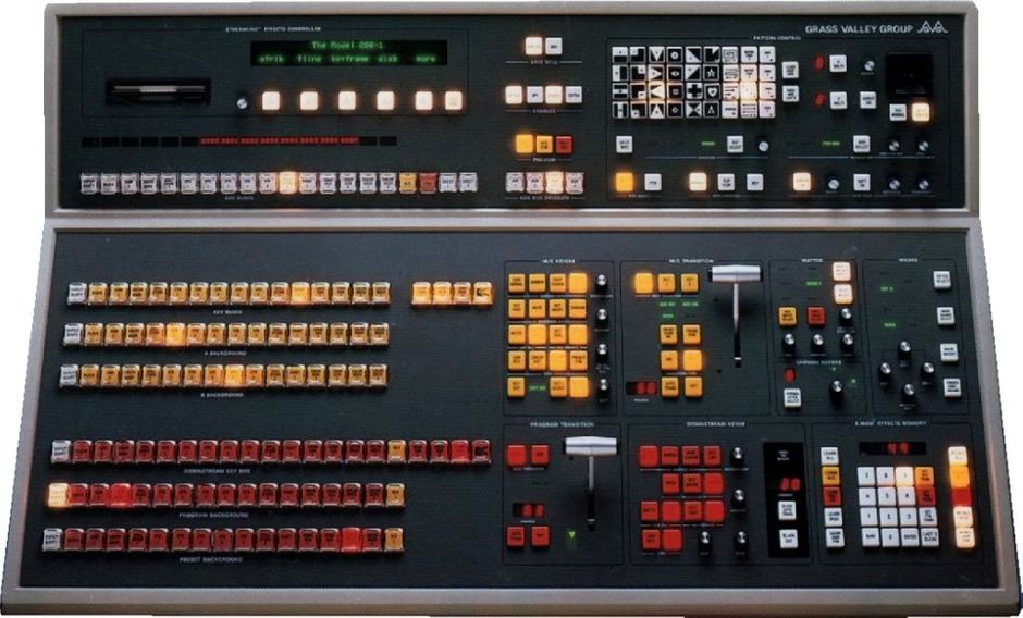 Vintage Grass Valley 200 Component Studio Broadcast Video Switcher Mixer

Model 200 Production Switcher
-Linear keying
-Optional Linear Borderline Key Edgar provides a variety of modes including multiple-line drop shadow, border, outline, and transparent shadows
-Preset wipe l Optional multi-format chroma keyer for up to eight sources. You can use an RGB signal from a camera or color difference signal from a Beta or MII component tape source
-Luminance key
- “Over” Function Switch-layer keyer priority in each mix affact
-Auto select mode l Accumulative latch for fill and key signals
-Six assignable external key source inputs/mix effect
-Four external key fills/mix affect
-Standard Key Masking. You can create realistic key effects with the dedicated shutter (box) mask, external key mask or either ME wipe output in any keyer-including the downstream keyer. To optimize key appearance, the mask system also features invert and forced foreground modes
-Key Memory. Key selection recalls clip, hue and gain
-Horizontal and Vertical Multipliers. Multiply a basic pattern from one to four times on the horizontal or vertical axis
-Border, soft and border symmetry modes l Rata controlled positioner
-Normal, reverse, and flip-flop wipe direction modes
-Four Learn User Wipe Registers. Saves wipe pattern and all modifiers, so you can recreate the setup at the push of a button

Matrix Wipe Patterns

l 32 Programmed Wipe Patterns. Six patterns are available through dedicated buttons, and 26 through user personality assignment
l 64 x 48 Pattern. You can fill the screen with over 3,000 tiles
l Pattern Mix Mode. Modulates any analog wipe pattern with the selected matrix pattern for an endless variety of effects

With 20 primary inputs and two mix effects, the 200 gives You more keying power than has ever been offered in a mid-sized production switcher.

For starters, the 200 gives You the creative freedom of five powerful keyers, two in each ME and one downstream. You can use either ME as a background for the downstream keyer, which also includes a fade-to-black and an output blanking processor.

The 200 gives You one matte generator for each keyer, one for each wipe system, and two background generators-for a total of nine-in addition to the color-black generator. And for even more creative versatility, the background generators provide background wash.

The 200 standard affects memory system gives You the fraadom to program affects with standard registers and quickly recall them on any switcher level.



When you need to move fast, you’ll appreciate the 200’s aasyto-use features, including look-ahead preview, preset black mix and auto delegation. Plus display windows for mounting Horizon multi-destination routing displays. Model 200 Production Switching