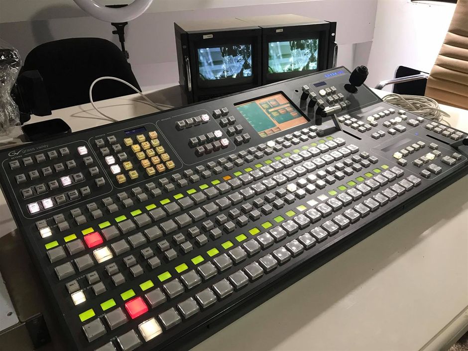 Grass Valley Kayak DD2 M/E Switcher. 
The Grass Valley Kayak DD 2 M/E Digital Switcher is a highly affordable system designed for live production, small studios, and editing applications. It features a compact 3 RU design, fully digital 10-bit video processing, and low power consumption. The system includes a powerful mix/effects (M/E) architecture with eight high-quality keyers, eight channels of built-in digital effects, and optional chroma keying capabilities. The KayakDD system features an intuitive menu with an integrated touchscreen color display and is switchable between 525-line and 625-line formats. It also supports a range of industry-standard machine-control protocols for managing VTRs, servers, edit controllers, and other production equipment. Optional Grass Valley RAMRecorder software for internal clip and still storage and optional RGB color correction are also supported. The KayakDD router interfaces with the Grass Valley Jupiter control system, the Grass Valley Encore control system, and a number of third-party controllers.