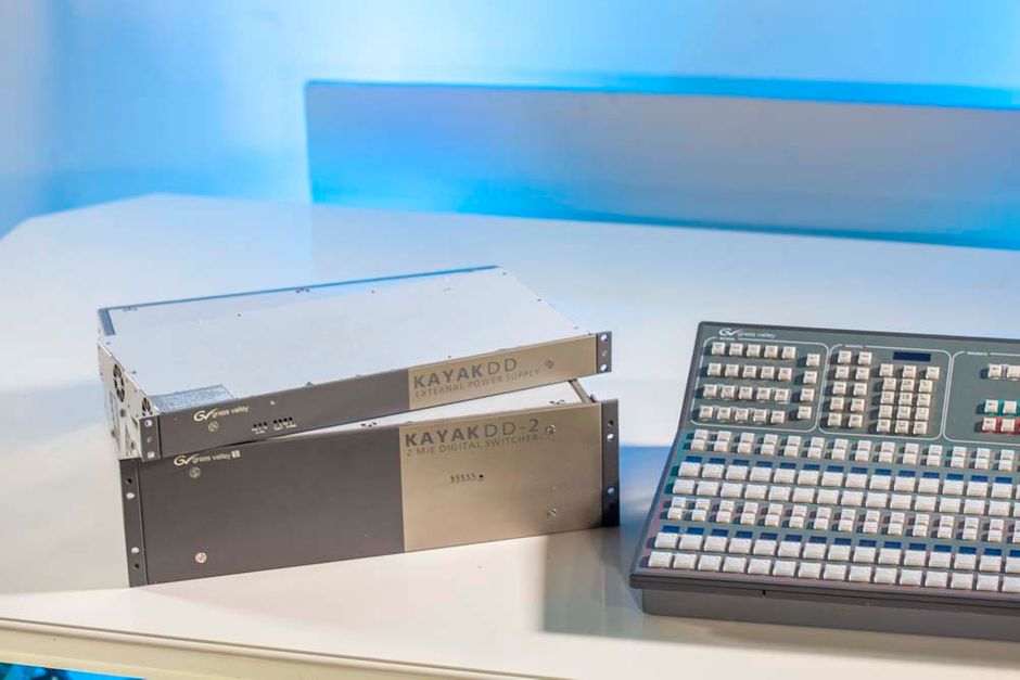 Grass Valley Kayak DD2 M/E Switcher. 
The Grass Valley Kayak DD 2 M/E Digital Switcher is a highly affordable system designed for live production, small studios, and editing applications. It features a compact 3 RU design, fully digital 10-bit video processing, and low power consumption. The system includes a powerful mix/effects (M/E) architecture with eight high-quality keyers, eight channels of built-in digital effects, and optional chroma keying capabilities. The KayakDD system features an intuitive menu with an integrated touchscreen color display and is switchable between 525-line and 625-line formats. It also supports a range of industry-standard machine-control protocols for managing VTRs, servers, edit controllers, and other production equipment. Optional Grass Valley RAMRecorder software for internal clip and still storage and optional RGB color correction are also supported. The KayakDD router interfaces with the Grass Valley Jupiter control system, the Grass Valley Encore control system, and a number of third-party controllers.