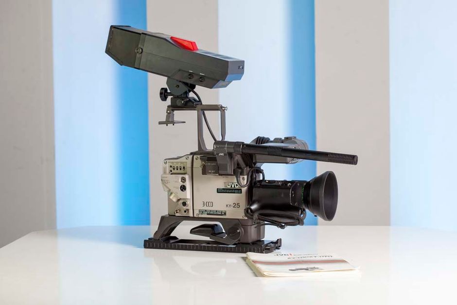 FULL SETUP JVC Vintage Broadcast Television Mobile Studio. We keep 2 versions. The first version is with 3 ccu and umatic video recorder and the second version with 4 ccu and s vhs recorder.

The kit including:

2 x JVC Monitors PAL

1 x JVC KM-1200 SPECIAL EFFECTS GENERATOR PAL

1 X SONY UMATIC RECORDER OR JVC RECORDER (The price is for the first version with the umatic)

3 X CCU RM-P200 REMOTE CONTROL UNIT PAL (OR 4 CCU IF YOU MAKE CHOISE WITH JVC BR S610E VHS VERSION)

1 X RACK MOUNT POWER SUPLIER

1 X RACK MOUNT LIGHT STANT WITH DIMMABLE LIGHT BULBS

1 X MOBILE RACK

1 x analog pc card for live streaming

3 x JVC KY 15 video camera (one of them with portable MII video extra)

KY-15U THREE-CCD COLOR VIDEO CAMERA FEATURES

3 half-inch CCDs (330,000 pixels) with prism optical system
Excellent picture quality, 500 line resolution, 58dB s/n
Multi-format output compatible with M-II and S-VHS
Integrates with S-VHS portable for camcorder operation
RS-170A encoder for broadcast quality signal
High-speed electronic shutter
Stereo audio circuit
2H vertical contour correction, matrix masking circuit
Negative/positive image reversal circuit
Hot Shoe viewfinder and microphone connections


KY-15 THREE-CCD COLOR VIDEO CAMERA
In response to the demand for higher-quality visual images, JVC announced the development of the S-VHS format and has strived to introduce products of this format to the market. In doing so, the release of cameras which would perfectly match S-VHS recorders has been awaited.

Meanwhile, in the professional ENG camera market, cameras using solid-state pickup elements are becoming the mainstream, replacing those with tubes, because of their advantages in operability, size and weight. Also, cameras that can be used in the camcorder configuration are increasingly appreciated as they provide more mobility in newsgathering and field production.

The KY-15U series cameras, using 1/2