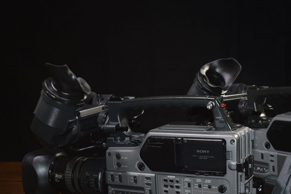 Vintage Sony DSR-250.
With the stability of its shoulder mount design, light weight, and long list of innovative and convenience features, it is no wonder the Sony DSR-250 Camcorder has become the prototypical event-video production camera for shooters big and small.  The DSR-250 can record in the professional DVCAM format or the consumer DV format, and it accepts both large and small cassettes for a maximum recording time greater than 3 hours.

Sony's equipped the DSR-250 with three 1/3