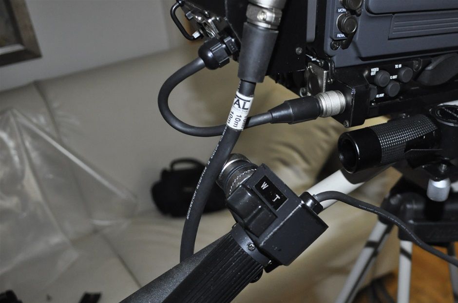 Ikegami HL-DV7AW SDI 16:9 NTSC Camcorder + CCU Adapter

New Digital Process LSI
New digital process LSI (ASIC) is adopted to produce high quality video including a six - axis linear matrix system for fine tuning of color to match broadcast requirements.

Video In connector
The HL-DV7AW includes External Video Input. Pool feed or other video source can be recorded by the tape recorder section of this camera recorder. Allows user to Input an external video source for the purpose of recording it to the DV tape deck inside the camera.

Low smear and high sensitivity CCD
High quality CCD are employed to reproduce good quality PIctures even under very low light condition.

+48dB Hyper Gain for very low light conditions
Hyper gain of +48dB is provided so that good video reproduction is assured even in the harshest shooting conditions.

Super V
To enhance Vertical resolution, the Super V function can be enabled, increasing Vertical Resolution by 20%, to achieve natural picture reproduction with remarkably fine resolution.

High Resolution Viewfinder
A high resolution broadcast use 1.5 inch viewfinder is employed, featuring over 600 horizontal lines resolution. Ease of operation is carefully considered, e.g. Brightness, Contrast and Peaking controls are easily accessible on the front of the viewfinder and a rear tally light is provided. The positioning of the viewfinder is easily adjustable.

Additional Detailed Information:

DVCAM FORMAT
High Picture Quality Digital Component Recording
The DVCAM format is a digital system with Luminance signal (Y) and Color Difference signals (R-Y, B-Y).


PCM Digital Audio System
Two modes are selectable between 2ch (48kHz sampling frequency) and 4ch (32kHz sampling frequency) which may be useful for Audio After Recording (dubbing).

Long Recording Hours
Standard size cassettes have a max. 184 minutes recording time, while mini-cassettes have max. 40 minutes recording time.		
HL-DV5


EXPRESSION

Preset and Variable Shutters
The preset shutter has six speeds (1/100, 1/120, 1/250, 1/500, 1/1000, 1/2000 seconds) and variable speeds can be set between 1/60.3 and 1/787 seconds ( 1/50.3 and to 1/781 for PAL).


Diagonal Detail for higher picture quality
The diagonal detail function increases sharpness in the diagonal direction. This function also helps to reduce cross color moire in NTSC.


Skin Detail for favorable reproduction
The skin detail function is used when skin quality is being emphasized. The edge sharpness of the skin tone can be softened so that wrinkles or age lines become less visible on the TV screen. AHD, Auto Hue Detect, for easy setting of Skin tone detail is employed.


Soft Detail Function
To ensure picture uniformity even with high contrast areas, Soft Detail is employed to produce images that are more natural, without excessive adge enhancement.


Variable Detail Settings
8 step variable frequency boost of the detail signal and B/W balance function which controls center luminance level of detail signal are provided to have better detail effects depending on the subject.

 
HL-DV7W:	2.97MHz to 6.84MHz at 4:3 mode
3.24MHz to 9.00MHz at 16:9 mode
HL-DV5:	2.97MHz to 6.84MHz


Various GAMMA settings
Not only are 4 types of GAMMA characteristics selectable (OFF/0.35/0.4 /0.45), but a GAMMA curve pattern with x5 initial gain is also selectable for certain broadcast requirement.


Black Press
To emphasize only the brighter areas of images, Black Press is provided. It is selectable in 3 steps (-7%, -5%, -3%). It can add contrast to a washed out picture.


Black Stretch
The black stretch function meets the needs of professional camera-persons who want to avoid excessive dark areas in high contrast scenes. With three settings (3, 5 and 7%), this function enables improvement in dark areas in the picture by lifting the image level of only low brightness areas.


Shock-less Auto White Balance
To avoid a sudden change in white balance when switching between white balance memories, change over time is selectable. This function exhibits superb results when the scene changes from an indoor to outdoor shot or vice versa.


OFF:	Changes Memory Data instantly
ON - 0.3s :	Changes Memory Data in 0.3 seconds.
ON - 0.5s :	Changes Memory Data in 0.5 seconds.
ON - 1.0s :	Changes Memory Data in 1.0 seconds.
ON - 1.5s :	Changes Memory Data in 1.5 seconds.
ON - 2.0s :	Changes Memory Data in 2.0 seconds.


OPERATION

A low center of gravity camera design
Ikegami's long and rich experience in professional TV camera design has enabled us to produce a one-piece camera + recorder with excellent ergonomics and very good weight balance for the comfort of the operator.


Specially designed Shoulder Pad 
A newly and specially designed shoulder pad made of non-slip material makes camera work easier. The pad can be esily adjusted.


Convenient P. FUNC switch
P. FUNC (Personal Function) switch is provided for the most frequently used functions for the operator's convenience, such as control of scene file recall, Soft Detail, and Black Press/Black Stretch.


Rotary Encoders for easier Setup
On the lower side of the camera, 3 rotary encoders are provided for easier access to setup parameters. This allows camera settings and checkups even without a remote control panel.


Camera Menu
The camera incorporates a very practical menu system which is easy to navigate with a rotary encoder at the front of the camera. The menu can be customized for specific users by changing which control items are included.


Instant recall to the Factory Preset condition
Sometimes it is useful to be able to go back to the factory's original settings. The 